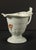 An authentic 18th century Chinese porcelain vessel Small creamer pitcher in characteristic helmet shape Hand painted with...