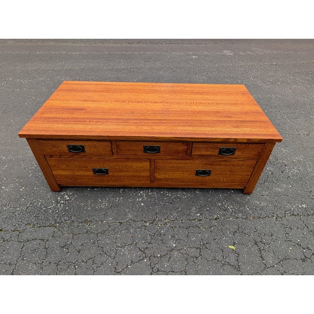 This exceptional Mission style coffee table anchors any living space with the unmistakable boldness of antique tiger oak....