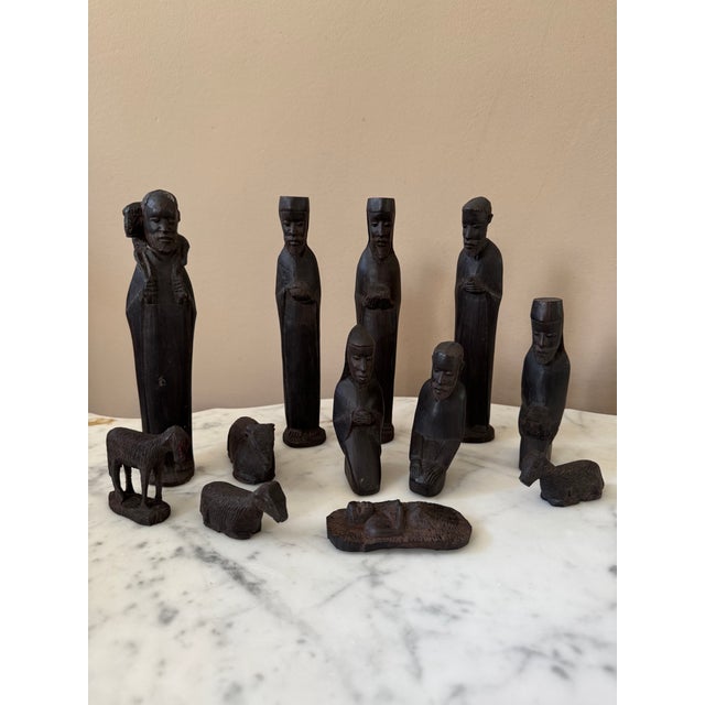 Vintage hand-carved ebony nativity set. Eleven pieces. Likely from Kenya or Tanzania; I don't have this item's provenance.