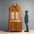 Walnut and burl walnut trumeau, crafted in Italy in the first half of the 20th century. The structure features an elegant...
