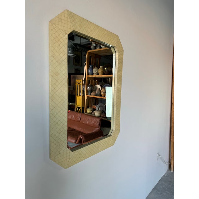 I'm Pleased to offer for sale this exquisite Vintage tessellated bone frame & beveled glass wall mirror by Enrique Garcel....