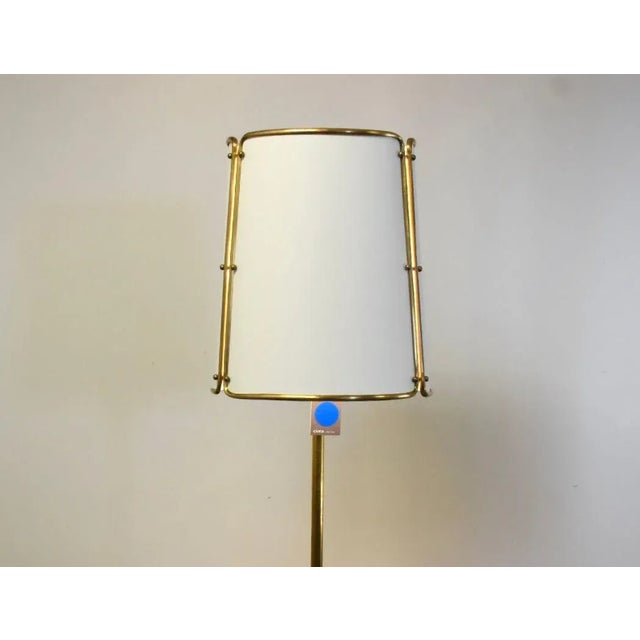 A modern Visual Comfort Carrier and Company Hastings 2 light traditional floor lamp. 18” wide. 18” deep. 71.5” tall.