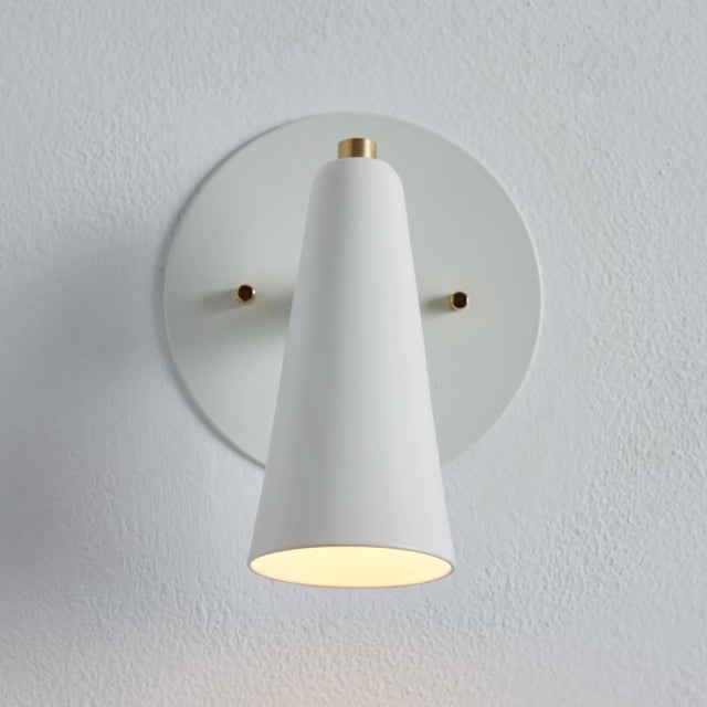 Pair of 'Lupita' sconces in white and brass by Alvaro Benitez. Hand-fabricated by Los Angeles based designer and lighting...