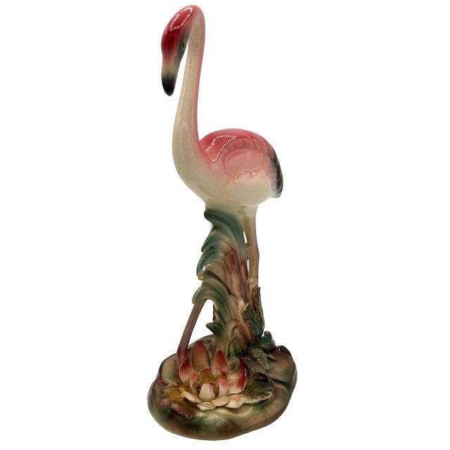 Mid-century pink and green ceramic flamingo tabletop statue by Brad Keeler. It features a beautifully detailed pink...
