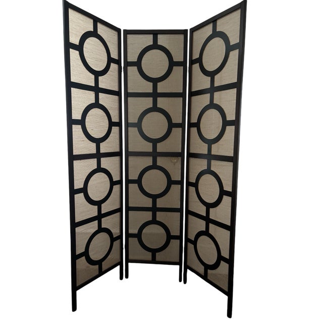 Here’s a late 20th century vintage room divider in a modern style. The frame is made of wood with a synthetic mesh...