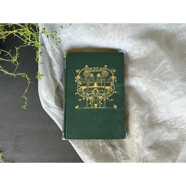 This antique edition of A Child's Garden of Verses by Robert Louis Stevenson has beautiful illustrations by the noted...