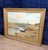 A. Monier 1906: Oil on canvas "Lakeside Landscape" / 112 x 140 cm. Boats beached on the riverbank with a castle tower on a...