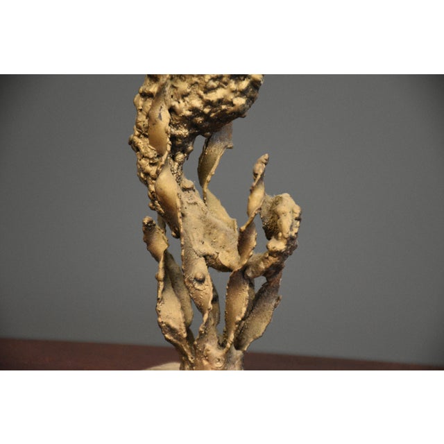 An abstract modern gold colored bronze sculpture of a seahorse. Circa 1970’s. Excellent condition. 2" wide. 2.5" deep. 8"...