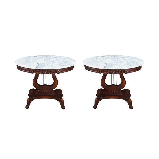 Pair of Victorian Revival Oval Parlor Console Table, Circa 1970s. Features a Cherry frame with white marble top. The oval...