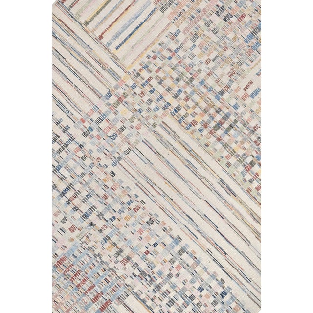 Beautiful hand knotted modern rug. Made of 75% wool and 25% cotton with very modern design and colors, this extremely...