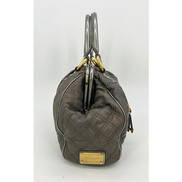 Marc Jacobs Gray Quilted Leather Gold Stam Bag in good condition. Measurements: 15"x10"x7" 5" handle drop 13" strap drop