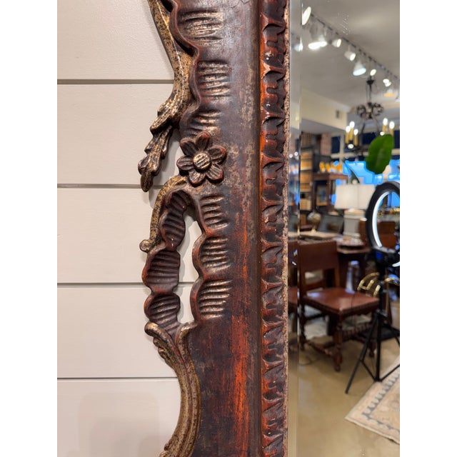 Love this 19th Century Italian Rococo wall mirror with its heavily carved and ornate frame. The intricate scrollwork and...