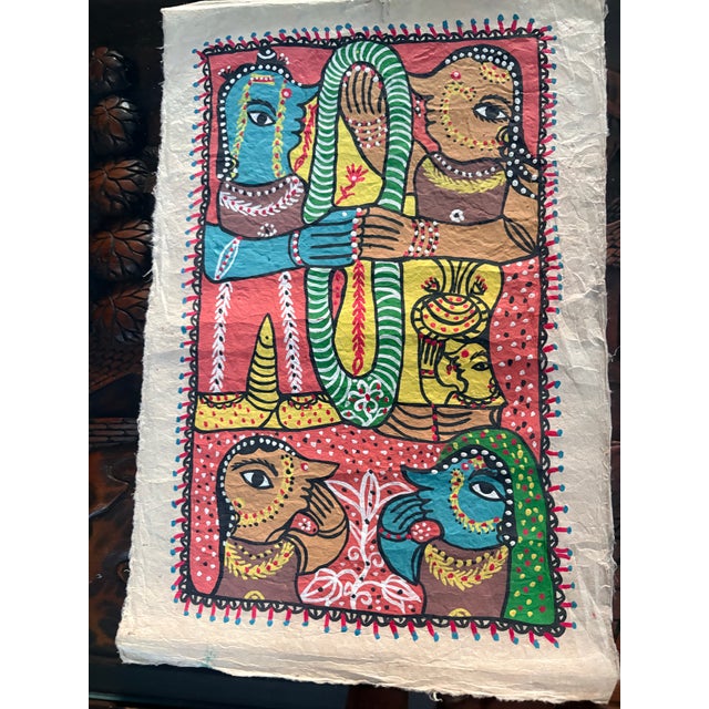 This artwork is a traditional Indian Madhubani ( Mithila) Folk Art Painting from Bihar, India on hand made paper....