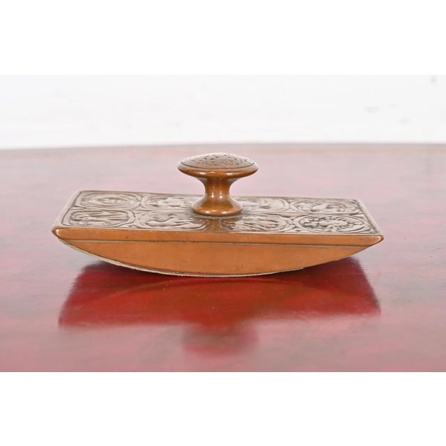 A beautiful antique bronze rocker ink blotter featuring Zodiac designs By Tiffany Studios (signed on the side) New York,...