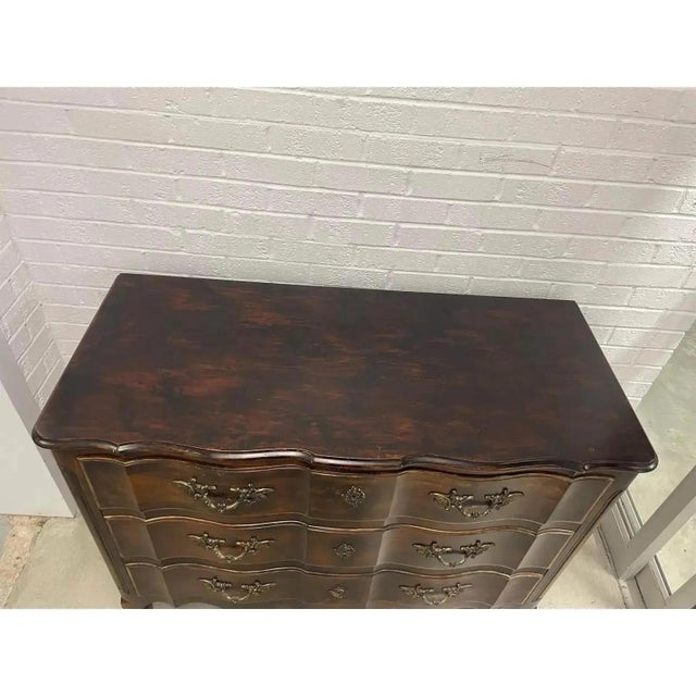 Offered is a vintage solid wood chest by John Widdicomb. This piece features three smooth gliding dovetailed drawers,...