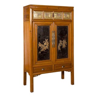 Chinese Early 20th Century Lacquered Armoire With Gilt Carved Warrior Motifs For Sale