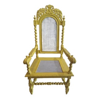 Antique Victorian Renaissance Revival Carved Wood Cane Armchair in Yellow For Sale