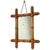 Antique faux bamboo mirror featuring its original foxed mirror plate and executed entirely in the Chinoiserie style—a...