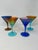 This lovely set of four martini glasses features incredible colors and would be a wonderful addition to any room....