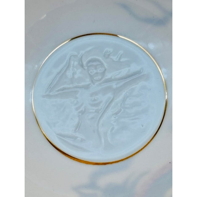 This rare Dragon Ware porcelain cup with matching saucer feature a beautiful moriage 22kt gold leaf dragon the exterior of...