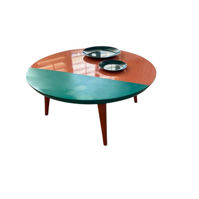 Russel Wright for Conant Ball round maple table in the perfect two tone hues of teal and coral lacquer. Perfectly...