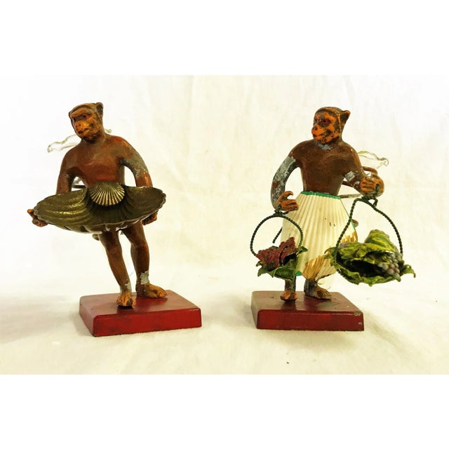 A fun and quirky pair of vintage Petite Choses bud vases! The pair includes both the male and female monkey servants. One...