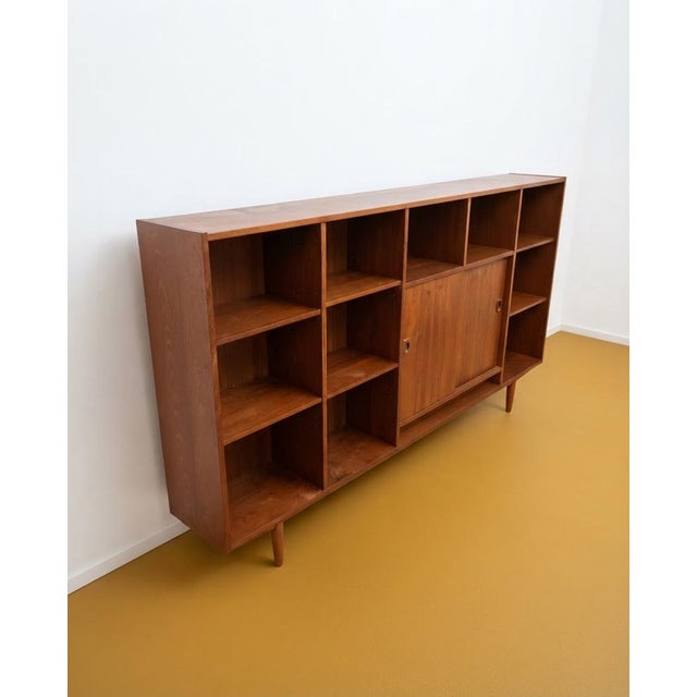 1950s danish teak bookcase with open shelves and sliding doors, 200cm 1950s danish teak wall/bookcase, 200cm wide, with...