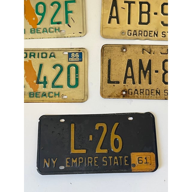 7 vintage license plates, from Naj, Anyang FL states. Collectible, decorative.