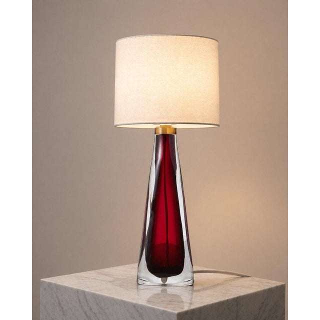 Striking mid-century modern table lamp designed by Carl Fagerlund for Orrefors, Sweden, circa 1960s. This sculptural piece...