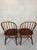 2 bar chairs. Probably for Ercol. Beautiful vintage condition. The signs of use provide a pleasant patina. Height: 89cm....