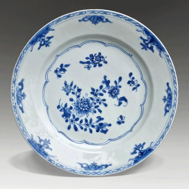 A fine Chinese porcelain dish dating to the Yongzheng period of the Qing Dynasty, circa 1725. The dish is hand painted in...