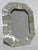 Abalone Shell photo frame. Octagonal-shaped frame with glass face and grey velvet back stand. Shell is treated with amber...