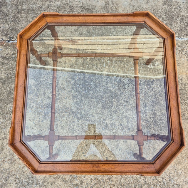 This is a wonderful vintage faux bamboo coffee table by American furniture maker Lane. The coffee table is made of solid...