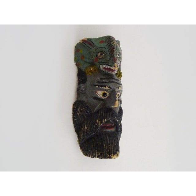 Antique Mexican Polychrome Carved Wooden Mask. 1970s Beautiful antique Mexican hand-painted wooden mask depicting a man...