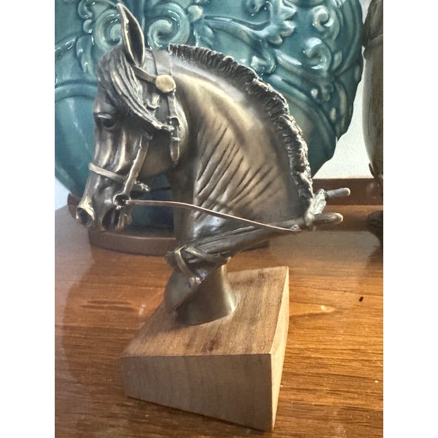 A bronze casting of a head of a horse titled Blakken Head, by Robert Larum in the artist’s mature and characteristic...