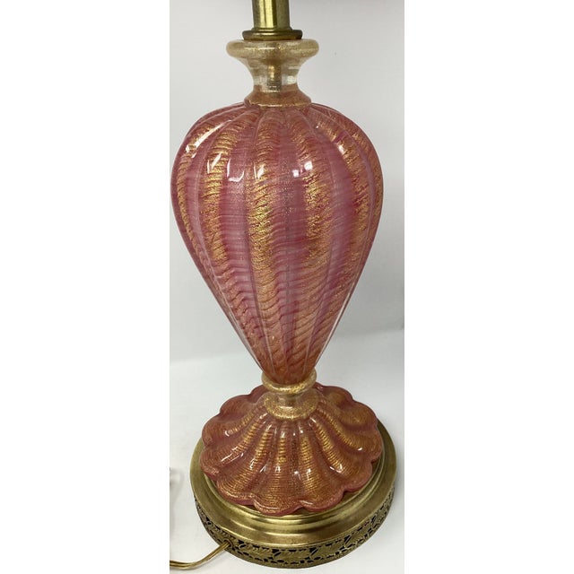 This Mid-Century Italian Murano glass lamp made by Barovier & Toso is one on their most sought after designs. Featuring a...