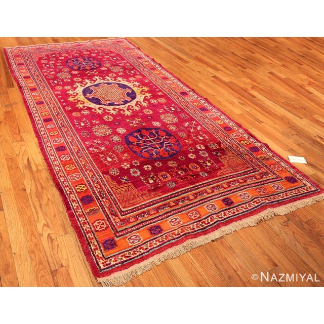 An Exciting Artistic and Funky Vintage Purple Pomegranate Design Silk Khotan Rug, Country of Origin / Rug Type: East...