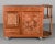 An Art Deco style Italian marquetry bar bart or drinks trolley, made of mahogany, and richly detailed all around with...