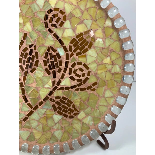 This vintage terrazzo mosaic platter showcases a stunning blend of glass and clay, creating a textured and artistic...