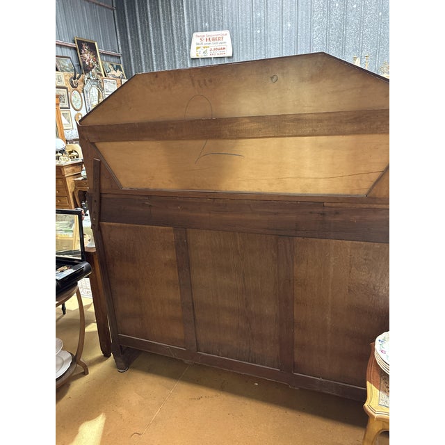 Elegant French Art Deco sideboard dating from the 1930s, crafted in beautifully figured walnut veneer with its original...