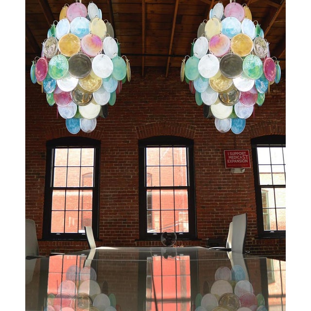 Vintage Italian Murano chandeliers in Vistosi style. The chandelier has 87 fantastic multicolored alabaster iridescent...