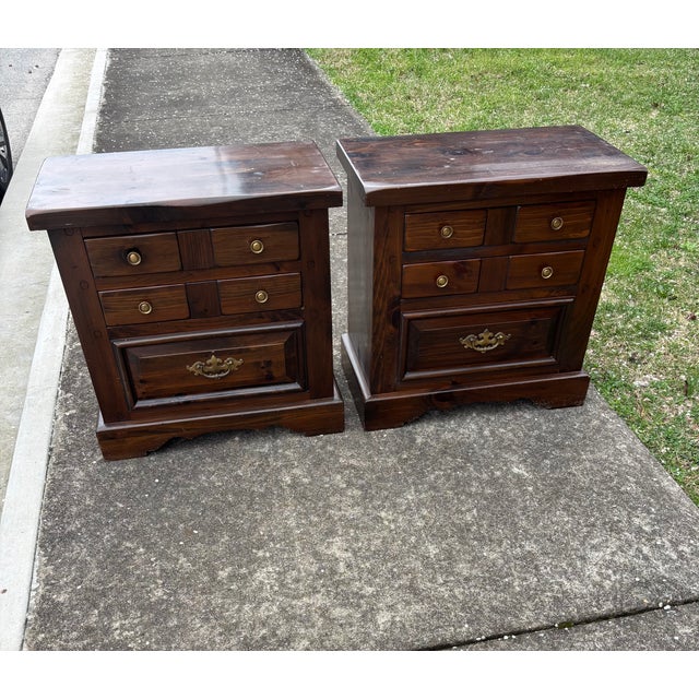Pair of Heywood Wakefield Wood Nightstands in a Darker Stain Color with Three Drawers each.