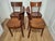 This set of four wooden chairs features a lightweight, highly durable construction and a simple, elegant design. The...
