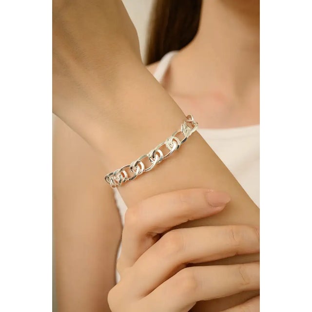 Elevate your style with the Handcrafted Pure 925 Sterling Silver Twisted Cuban Chain Unisex Bracelet by Caratandher....