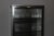 Iron and glass medicine display case, black patina, four shelves, it opens with a door, circa 1940, overall in very good...