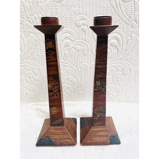 Enhance your collection of antique Chinese artifacts with this exquisite pair of 1890's Chinese Lacquer Candlesticks. The...