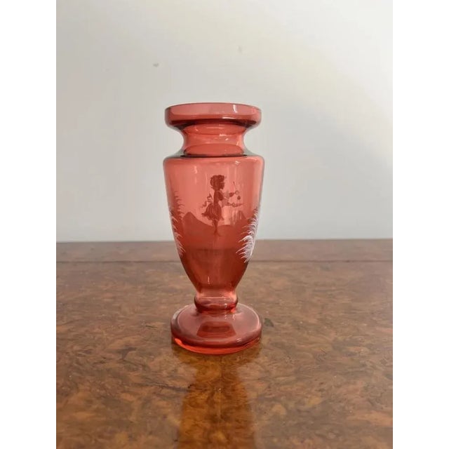 Antique Victorian Mary Gregory small vase having an antique Mary Gregory small vase with a shaped body and a circular...
