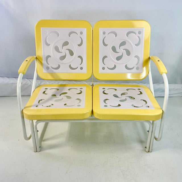 This is a wonderful find. A metal outdoor glider from the 1970s in fabulous condition. It’s a cheery Canary Yellow and...