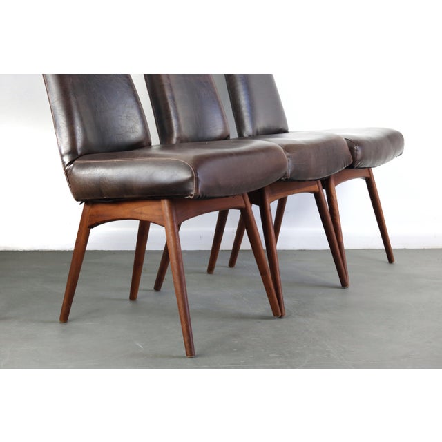 This gorgeous set of four vintage modern dining chairs feature an unusual high backrest ensuring maximum comfort. Stylish...