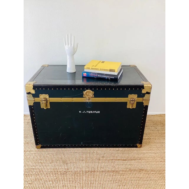 Vintage 1950s Storage Trunk black in color brass / gold metal hardware marked genuine vulcanized trunk fibre binding made...
